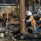 PG&E workers repair power lines in the Coffey Park neighborhood following the damage caused by the Tubbs Fire on October 13, 2017 in Santa Rosa, California.